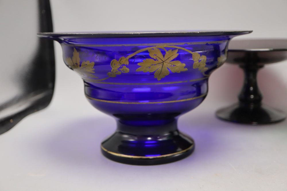 A Victorian silver-mounted Victorian coloured glass decanter, a tazza, a green glass and a blue bowl (4)